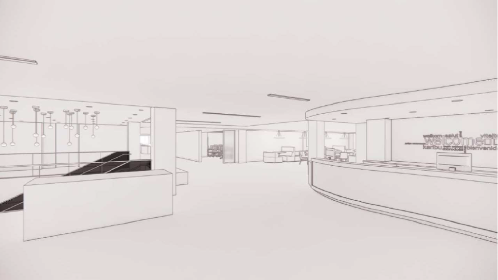 Near Help Desk on Main Level facing the Presentation Space. Learning Stair to lower level on the left.