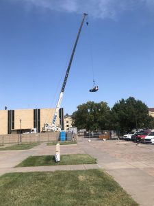 hess crane outside forsyth library removing debris